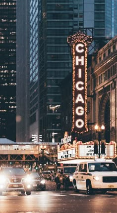 the chicago theater marquee is lit up at night