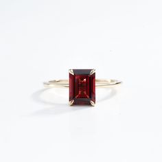 Emerald Cut Garnet Engagement Ring in Solid Gold - Red Garnet January Birthstone, Anniversary Gift Ring for Her This elegant emerald cut garnet engagement ring features a stunning red garnet set in solid gold. As the January birthstone, it makes a perfect anniversary or special occasion gift for her, blending classic beauty with a personal touch. Same design can be made also with other custom gemstones per request.  Product details: Stone - Natural Garnet Size - 6x8 Color - Red Metal - Solid Gol Garnet Ring With Prong Setting, Fine Jewelry Burgundy Garnet Ring, Burgundy Garnet Rings Fine Jewelry, Garnet Birthstone Promise Ring In Fine Jewelry Style, Garnet Birthstone Ring With Prong Setting In Fine Jewelry, Garnet Birthstone Ring In Fine Jewelry Style, Formal Garnet Birthstone Ring In Fine Jewelry Style, Classic Garnet Rings With Bezel Setting, Garnet Center Stone Birthstone Ring