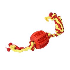 a red and yellow toy with a rope attached to it's side on a white background