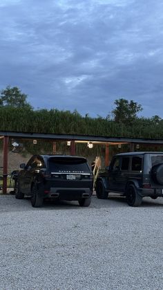 two vehicles parked in front of a building