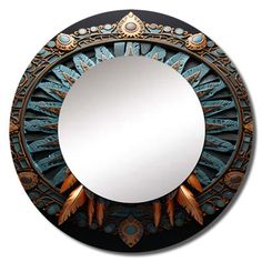 a round mirror with an intricate design on it