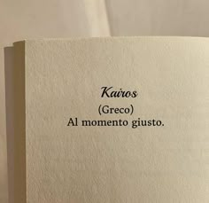 an open book with some type of writing on the front and back cover that says karoos grec al momento gusto