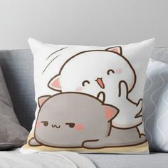 an elephant hugging a cat on the back of a couch throw pillow with its face close to it's head