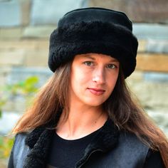 This sheepskin fur hat boasts a deep adjustable brim that can be rolled up or down to change both the look and the warmth factor. Elegant top stitched seams make it at home when you're feeling dressy, while classic styling and functionality mean it can transition smoothly between any number of cold weather uses!The name Caryn's Hat has its origins in a custom order that stuck around... A friend of David, the founder of Ithaca Sheepskin, brought him a hat and asked "Can you make me a hat like thi Shearling Hat With Faux Fur Lining And Ear Flaps, Brimmed Fur Felt Cloche Hat For Winter, Winter Fur Felt Brimmed Cloche Hat, Winter Brimmed Fur Felt Cloche Hat, Winter Fur Felt Hats For Cold Weather, Winter Brimmed Cloche Hat In Fur Felt, Winter Fur Felt Cloche Hat With Short Brim, Sheepskin Hat With Faux Fur Lining And Ear Flaps, Winter Fur Felt Hats With Faux Fur Lining