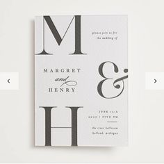 the letter m and h are printed on white paper