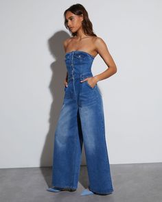 Trendy Strapless Denim Blue Jumpsuit, High Waist Strapless Jumpsuit With Pockets, Chic High Rise Strapless Jumpsuit, Chic Strapless Denim Jumpsuits And Rompers, Chic Wide-leg Denim Jumpsuit, Chic Dark Wash Wide Leg Denim Jumpsuit, High-waist Denim Blue Strapless Jumpsuit, Denim Blue High Waist Strapless Jumpsuit, High Waist Denim Blue Strapless Jumpsuit