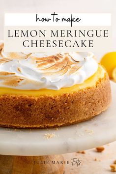 a lemon meringue cheesecake on a cake plate with the words how to make lemon meringue cheesecake