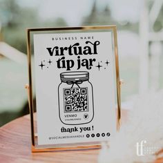 a sign that says virtual tip jar on it with a qr code in the jar