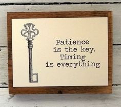 a card with an old key on it that says,'patience is the key '