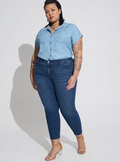 FIT Model is 5'9” wearing size 1. Measures 31” from shoulder (size 2). . MATERIALS + CARE Chambray woven fabric. 100% tencel. Machine wash cold. . Imported. DETAILS Collared. . Dolman sleeves. Button front. Chest pockets. The best plus size women's button up dolman chambray shirt & denim shirts in light blue made of tencel. Torrid is your destination for the freshest spring and summer styles. Torrid is your destination for plus size SALE > CLEARANCE merchandise. Denim Shirt Outfit, Dolman Shirt, Shirt Outfits, Peplum Shirts, Denim Shirts, Cute Blouses, Summer Styles, Chambray Shirt, Best Jeans