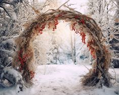 an arch made out of branches with berries on it in the middle of a snow covered forest