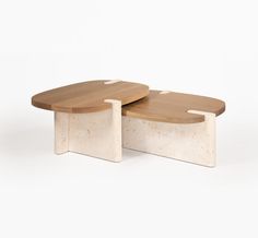 two wooden tables sitting side by side on top of each other in front of a white background