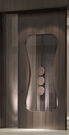 an artistic glass door in the middle of a room