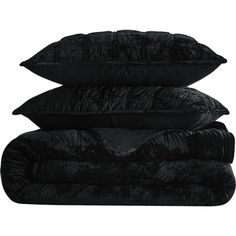 three pillows stacked on top of each other in front of a white background with the same black color