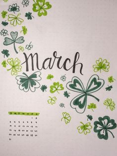 the march calendar is decorated with shamrocks