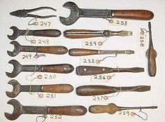 an assortment of tools are displayed on a white surface with numbers in the bottom right corner