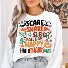 a woman wearing a white shirt with the words scare, share and sleigh all day happy halloween