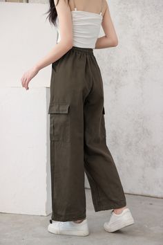 These wide-leg cargo pants are just what you need to get through the day. These baggy pants are perfect for running errands, heading to class, or relaxing at home. Made from a lightweight material, these pants will be your new go-to. Add a pop of color with a shirt or button-down top and pair it with your favorite sneakers.
Gender: WomenMaterial: PolyesterClothing Length: Full LengthClosure Type: Elastic Waist Relaxed Fit Wide-leg Utility Cargo Pants, Khaki Full-length Cargo Pants For Summer, Spring Utility Wide Leg Pants With Elastic Waistband, Baggy Straight Leg Cargo Pants With Elastic Waistband, Baggy Utility Cargo Pants With Elastic Waistband, Baggy Utility Cargo Jeans With Elastic Waistband, Versatile Green Cargo Pants, Baggy Green Cargo Wide Leg Pants, Casual Straight Parachute Pants With Cargo Pockets