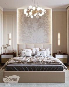 a bedroom with a large bed and chandelier hanging from the ceiling above it