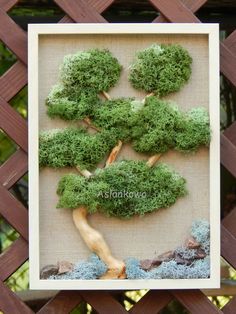 an image of a tree made out of moss on a wooden frame with the words thank you