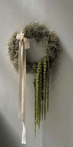 a wreath hanging from the side of a wall