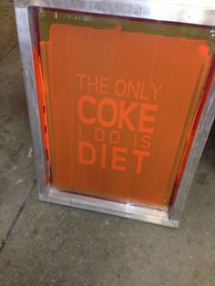 an orange sign that says the only coke diet is diet