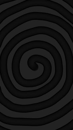 an abstract black and white background with spirals