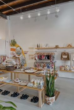 a store with lots of shoes and accessories on display