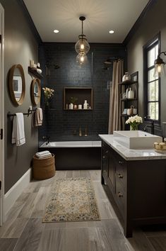 a bathroom with wood floors and black walls