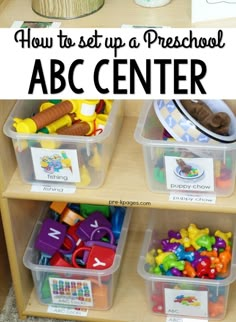 three plastic bins filled with toys and letters on top of a wooden shelf in front of a bookcase