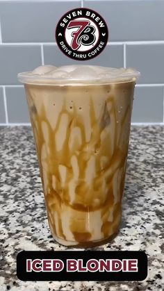 iced blondie in a plastic cup sitting on a counter