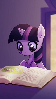 an open book sitting on top of a table next to a little pony with big eyes