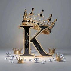 the letter k is surrounded by jewels and crowns