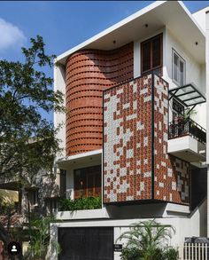 a building with red and white tiles on it