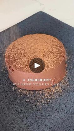 a cake that is sitting on top of a table with the words 3 ingredient written in front of it