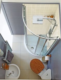 an aerial view of a bathroom with toilet and shower