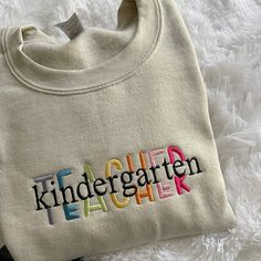 a sweater with the word kindergartaten on it