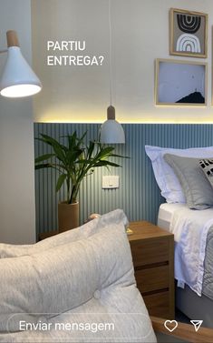 a bedroom with blue and white striped walls