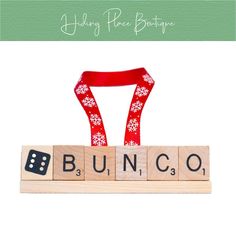 the word bunco spelled with dices and ribbon