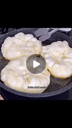 some food is cooking in a pan on the stove