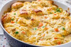 a casserole dish with meat and vegetables in it