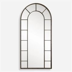 an arched mirror with glass panels on the front and back sides, against a white wall