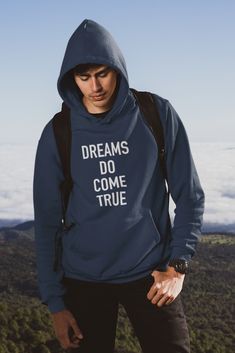 Dreams Do Hoodie Cozy up with our teasing hoodie to keep you warm.   Wear whenever, use forever   Be ready to fall in love!     50/50 cotton/poly fleece Air jet yarn for a soft, pill-resistant finish with two-ply hood Front Pouch Pocket. Made in the USA