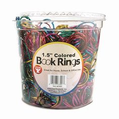 a bucket filled with lots of colorful paper clips