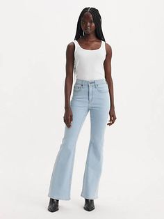 Our 726 High-Rise Flares are designed with a slim fit through your hip and thigh before flaring at the knee. Part of our signature ‘Lot 700’ fits, these jeans are designed to flatter;all day, every day. For those days when skinny jeans won't do Features a waist-defining high rise Finished with a flared leg Authentic denim character enhanced with supersoft stretch. For jeans that'll leave you starry-eyed. That's Levi's® Stellar Stretch. Thanks to excellent built-in recovery, they champion your cu Levis 726 Flare, Light Wash High Waist Fitted Flares, Light Wash Fitted High Waist Flares, Fitted High Waist Light Wash Flares, Fitted Flare Light Wash Bottoms, High Waist Fitted Flares With Five Pockets, Fitted Flare Jeans With Standard Cut Leg For Spring, High Rise Fitted Light Wash Flares, Classic Fitted Levi's Jeans