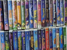 many disney movies are stacked on top of each other