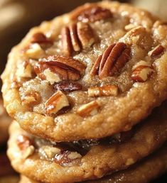 three pecan cookies stacked on top of each other