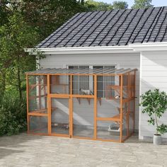 a small white house with an enclosed porch