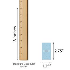 a wooden ruler is shown with measurements for the height and width of each piece in front of it