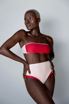 Standout in this classic bandeau strapless bikini top. This dainty contrast top has a back tie allowing for a customizable and secure fit. Made with recycled fabrics ensuring durability and comfort. Designed and made in LA Fully lined Removable cups Self: 80% Recycled Nylon / 20% Creora; Lining: 80% Recycled Nylon / 20% Creora Fabric from USA UPF 50+ Style# K4565T Contrast Top, 50 Style, High Waist Bottoms, Bandeau Top, 50 Fashion, Recycled Fabric, Upf 50, Twist, High Waisted